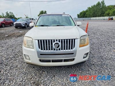 Piąte zdjęcie samochodu w środku: 2011 MERCURY MARINER PREMIER VIN:4M2CN8H75BKJ02202 - miniatura