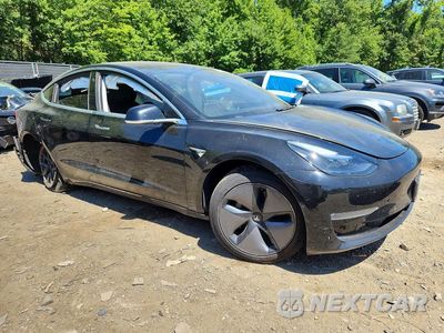 Czwarte zdjęcie samochodu z boku: 2018 TESLA MODEL 3 VIN:5YJ3E1EA2JF034482 - miniatura