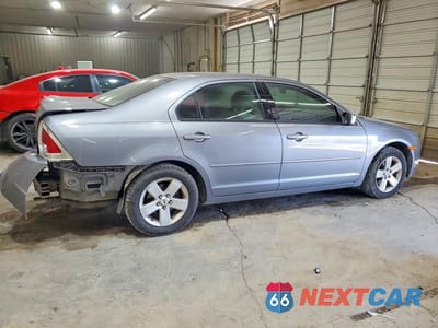 Trzecie zdjęcie samochodu z tyłu: 2006 FORD FUSION SE VIN:3FAFP07136R220851 - miniatura