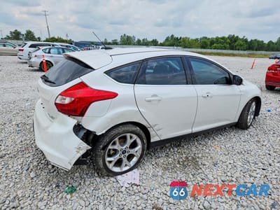 Trzecie zdjęcie samochodu z tyłu: 2014 FORD FOCUS TITANIUM VIN:1FADP3N27EL439510 - miniatura