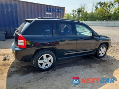 Trzecie zdjęcie samochodu z tyłu: 2009 JEEP COMPASS SPORT VIN:1J4FT47A29D139814 - miniatura