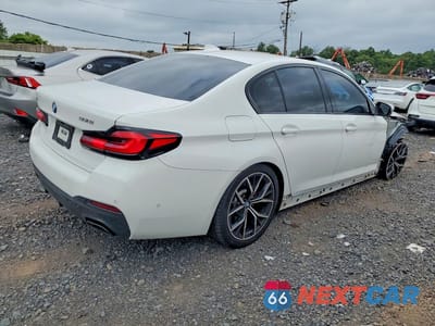 Trzecie zdjęcie samochodu z tyłu: 2022 BMW 540 XI VIN:WBA73BJ00NWX49432 - miniatura