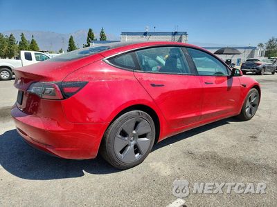 Trzecie zdjęcie samochodu z tyłu: 2023 TESLA MODEL 3 VIN:5YJ3E1EA5PF456254 - miniatura