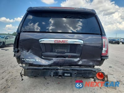 Zdjęcie 6 z 13 samochodu: 2016 GMC YUKON XL DENALI VIN:1GKS2HKJ9GR167913 - miniatura