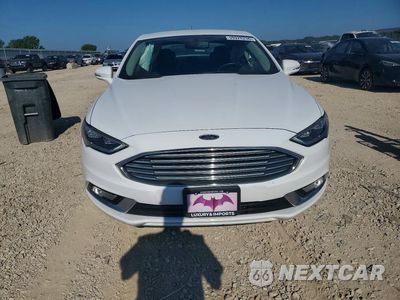 Piąte zdjęcie samochodu w środku: 2017 FORD FUSION SE PHEV VIN:3FA6P0PU3HR124974 - miniatura