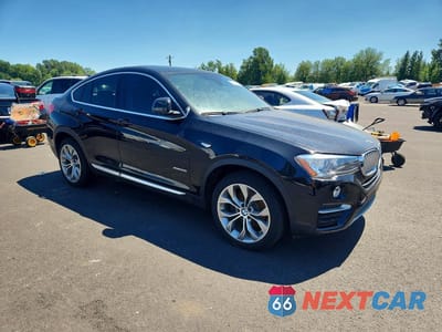 Czwarte zdjęcie samochodu z boku: 2016 BMW X4 XDRIVE28I VIN:5UXXW3C51G0M90320 - miniatura