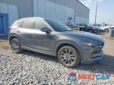 Czwarte zdjęcie samochodu z boku: 2021 MAZDA CX-5 SIGNATURE VIN:JM3KFBEY9M0354596 - miniatura