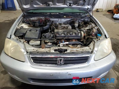 Zdjęcie 11 z 12 samochodu: 1999 HONDA CIVIC EX VIN:1HGEJ8649XL054340 - miniatura