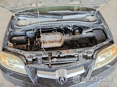 Zdjęcie 12 z 13 samochodu: 2006 ACURA MDX TOURING VIN:2HNYD186X6H549628 - miniatura