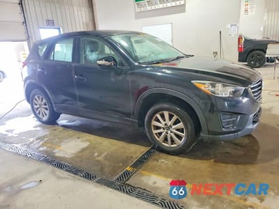 Czwarte zdjęcie samochodu z boku: 2016 MAZDA CX-5 SPORT VIN:JM3KE4BY5G0887777 - miniatura
