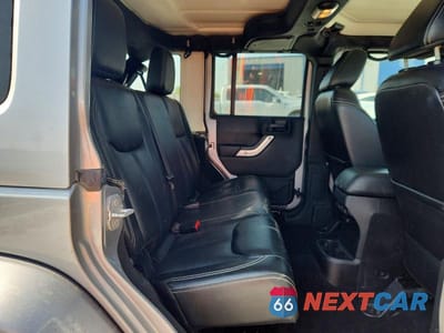 Zdjęcie 11 z 14 samochodu: 2015 JEEP WRANGLER UNLIMITED SAHARA VIN:1C4BJWEG0FL563913 - miniatura