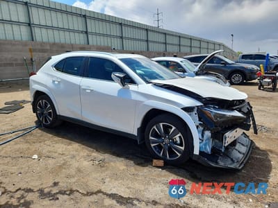 Czwarte zdjęcie samochodu z boku: 2023 LEXUS UX 250H PREMIUM VIN:JTHP6JBH4P2159509 - miniatura
