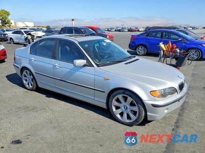 Czwarte zdjęcie samochodu z boku: 2002 BMW 325 I VIN:WBAEV33492KL68351 - miniatura