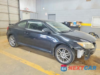Czwarte zdjęcie samochodu z boku: 2006 SCION TC BASE VIN:JTKDE177460091223 - miniatura