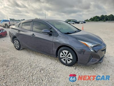Czwarte zdjęcie samochodu z boku: 2016 TOYOTA PRIUS TWO ECO VIN:JTDKARFU0G3013425 - miniatura