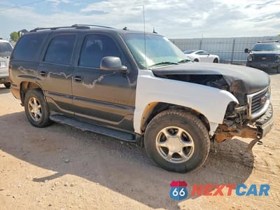 Czwarte zdjęcie samochodu z boku: 2003 GMC YUKON DENALI VIN:1GKEK63U63J165555 - miniatura