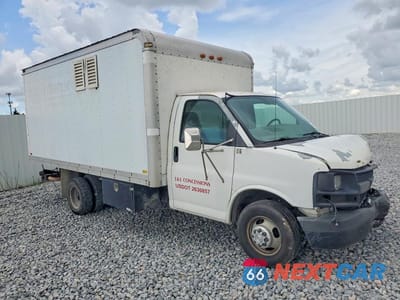 Czwarte zdjęcie samochodu z boku: 2006 CHEVROLET EXPRESS G3500 VIN:1GBJG31U961139621 - miniatura