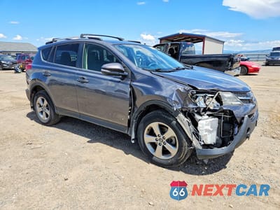 Czwarte zdjęcie samochodu z boku: 2015 TOYOTA RAV4 XLE VIN:JTMRFREV3FD126501 - miniatura