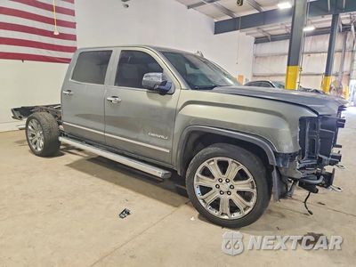 Czwarte zdjęcie samochodu z boku: 2018 GMC SIERRA K1500 DENALI VIN:3GTU2PEJXJG217154 - miniatura