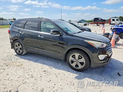 Czwarte zdjęcie samochodu z boku: 2014 HYUNDAI SANTA FE GLS VIN:KM8SN4HF0EU043341 - miniatura