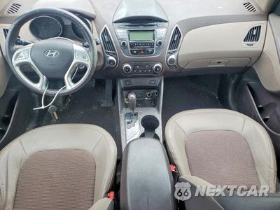 Zdjęcie 8 z 12 samochodu: 2012 HYUNDAI TUCSON GLS VIN:KM8JUCAC7CU375878 - miniatura
