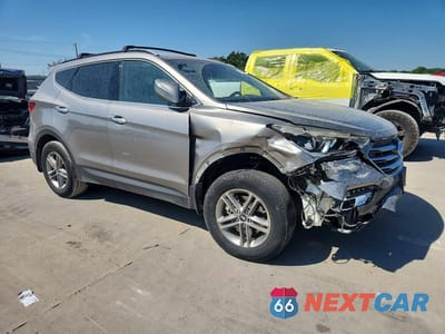 Czwarte zdjęcie samochodu z boku: 2018 HYUNDAI SANTA FE SPORT VIN:5XYZU3LB5JG549523 - miniatura