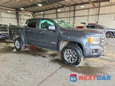 Czwarte zdjęcie samochodu z boku: 2015 GMC CANYON SLE VIN:1GTG6BE35F1197780 - miniatura