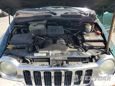 Zdjęcie 12 z 13 samochodu: 2003 JEEP LIBERTY SPORT VIN:1J8GL48K13W720338 - miniatura