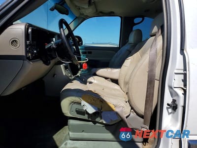 Zdjęcie 7 z 14 samochodu: 2002 GMC YUKON VIN:1GKEC13T42R131783 - miniatura