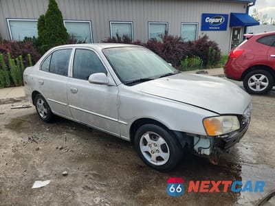 Czwarte zdjęcie samochodu z boku: 2001 HYUNDAI ACCENT GL VIN:KMHCG45C31U195343 - miniatura