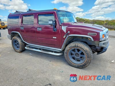 Czwarte zdjęcie samochodu z boku: 2006 HUMMER H2 VIN:5GRGN23U86H105260 - miniatura