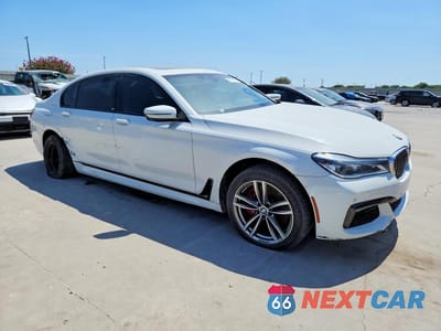 Czwarte zdjęcie samochodu z boku: 2018 BMW 750 XI VIN:WBA7F2C53JG423595 - miniatura