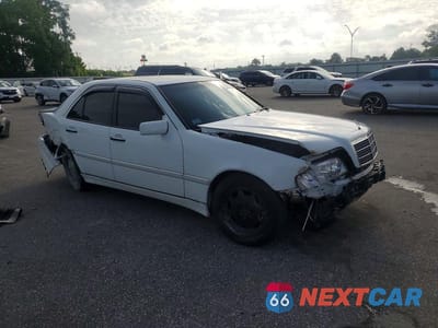 Czwarte zdjęcie samochodu z boku: 1999 MERCEDES-BENZ C 230 VIN:WDBHA24G6XA767048 - miniatura