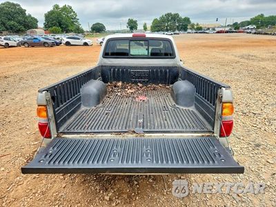 Zdjęcie 10 z 13 samochodu: 2004 TOYOTA TACOMA XTRACAB VIN:5TEVL52N74Z311952 - miniatura