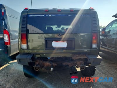 Zdjęcie 6 z 13 samochodu: 2003 HUMMER H2 VIN:5GRGN23U03H132240 - miniatura
