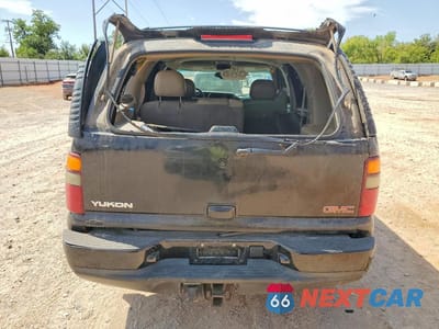 Zdjęcie 6 z 14 samochodu: 2003 GMC YUKON DENALI VIN:1GKEK63U63J165555 - miniatura