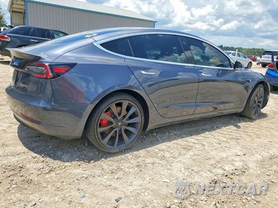 Trzecie zdjęcie samochodu z tyłu: 2020 TESLA MODEL 3 VIN:5YJ3E1EC3LF713360 - miniatura