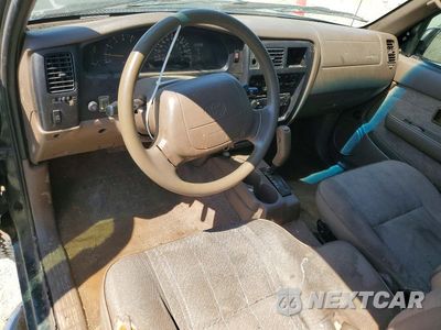 Zdjęcie 8 z 12 samochodu: 1999 TOYOTA TACOMA BASE VIN:4TASM92N2XZ511866 - miniatura