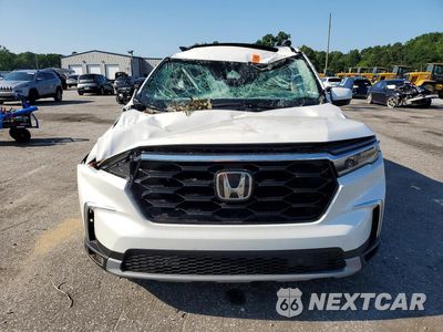 Piąte zdjęcie samochodu w środku: 2025 HONDA PILOT TOURING VIN:5FNYG2H79SB039881 - miniatura