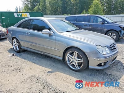 Czwarte zdjęcie samochodu z boku: 2009 MERCEDES-BENZ CLK 350 VIN:WDBTJ56H59F264926 - miniatura