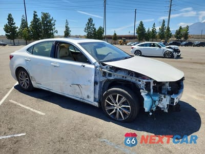Czwarte zdjęcie samochodu z boku: 2016 LEXUS ES 300H VIN:JTHBW1GGXG2101169 - miniatura