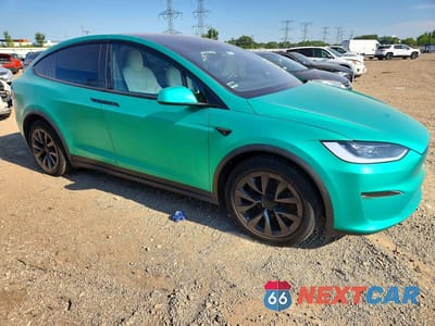 Czwarte zdjęcie samochodu z boku: 2024 TESLA MODEL X VIN:7SAXCAE5XRF459179 - miniatura