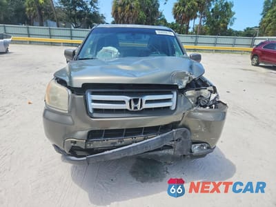 Piąte zdjęcie samochodu w środku: 2007 HONDA PILOT EXL VIN:5FNYF18577B033001 - miniatura