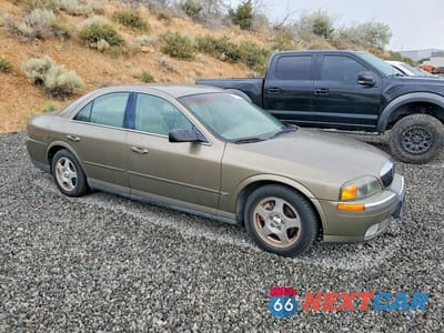 Czwarte zdjęcie samochodu z boku: 2001 LINCOLN LS VIN:1LNHM86S21Y705623 - miniatura