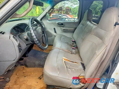 Zdjęcie 7 z 12 samochodu: 2000 FORD F150 VIN:1FTZX1727YKB02038 - miniatura