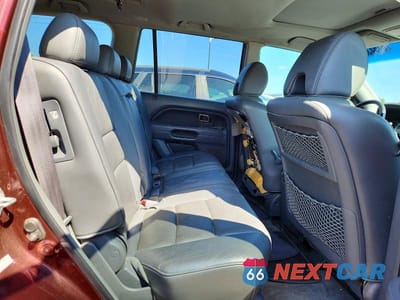 Zdjęcie 11 z 13 samochodu: 2007 HONDA PILOT EXL VIN:2HKYF18517H520910 - miniatura