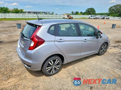 Trzecie zdjęcie samochodu z tyłu: 2019 HONDA FIT EX VIN:3HGGK5H81KM716360 - miniatura
