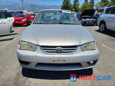 Piąte zdjęcie samochodu w środku: 2001 TOYOTA COROLLA CE VIN:1NXBR12E51Z522920 - miniatura