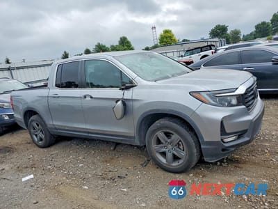 Czwarte zdjęcie samochodu z boku: 2023 HONDA RIDGELINE RTL VIN:5FPYK3F54PB013337 - miniatura