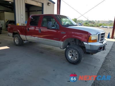 Czwarte zdjęcie samochodu z boku: 2002 FORD F350 SRW SUPER DUTY VIN:1FTSW31F42ED02683 - miniatura